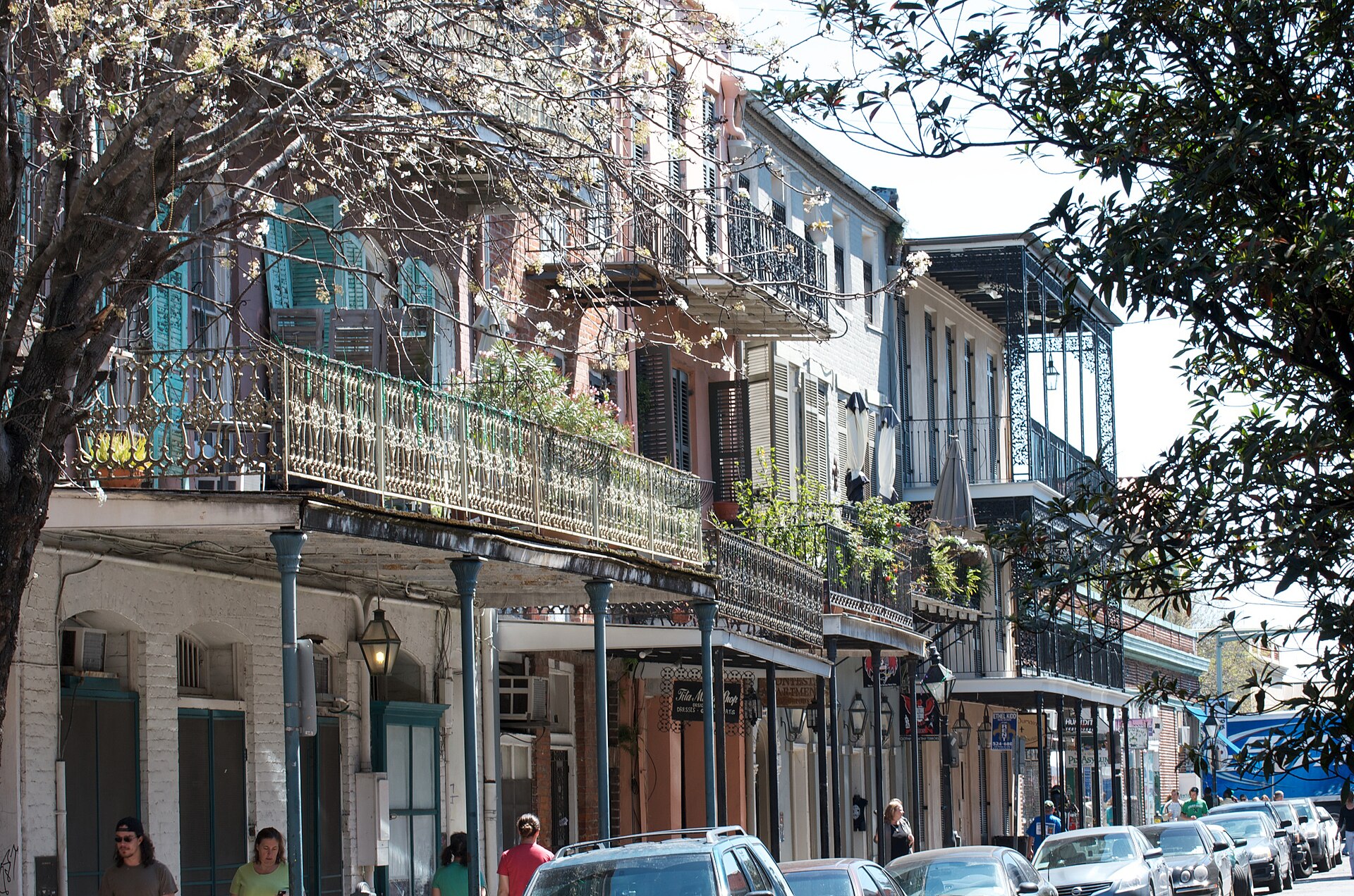 These wrought iron railings are typical of French Quarter architecture. Buildings on the downtown side of the 500 block of Dumaine Street.