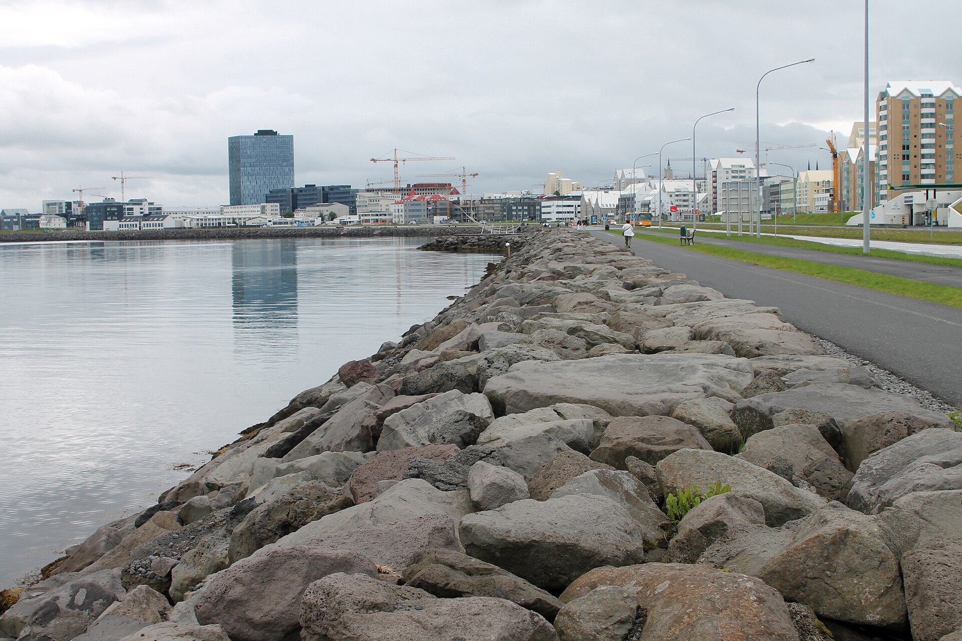 Rocks on the coast in Reykjavík. The ocean is to the left and the Short and Sculpture Walk is to the right.